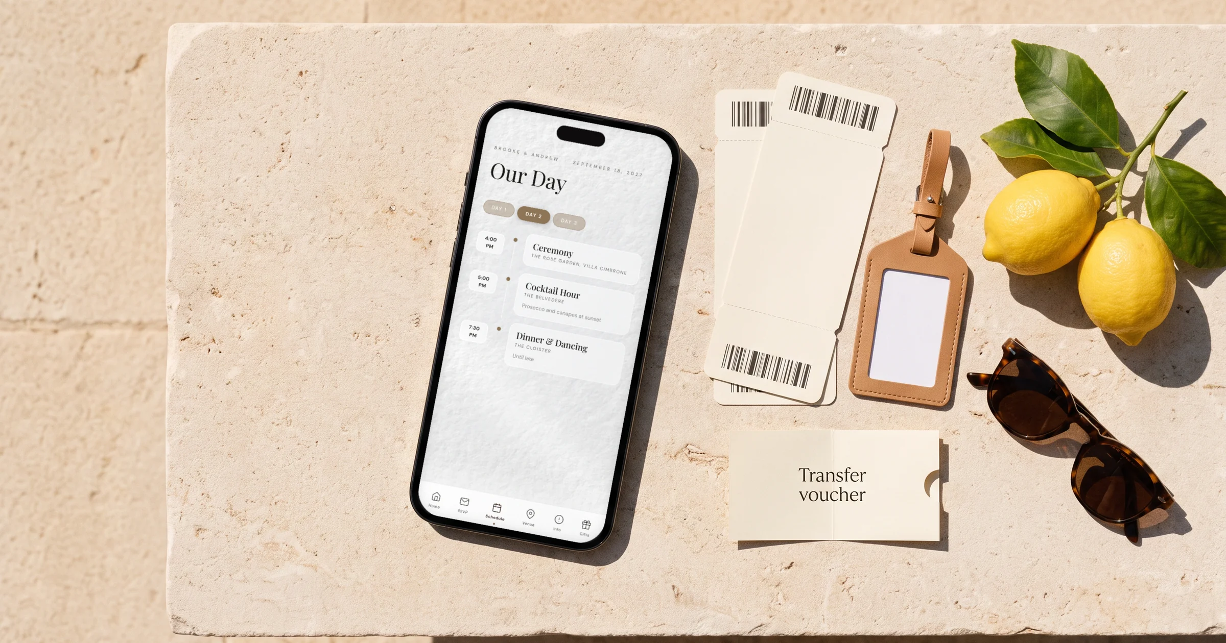 Destination wedding itinerary: a phone shows a three-day wedding schedule with Day 1, Day 2 and Day 3 tabs, next to boarding passes, a luggage tag, a transfer voucher and a lemon branch
