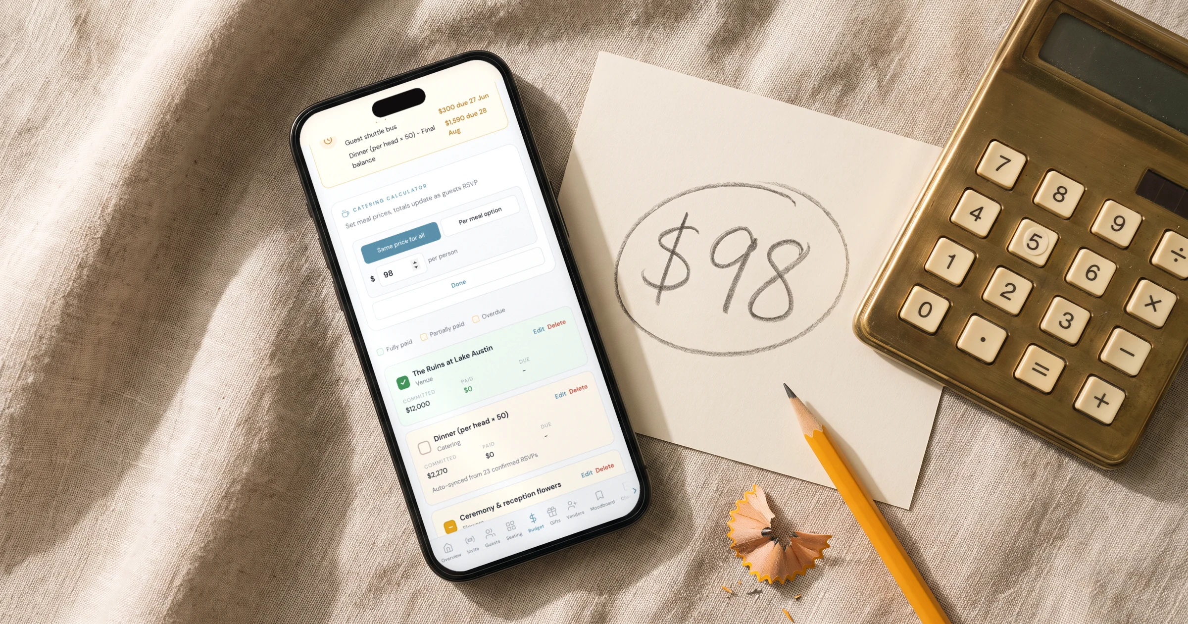 Most accurate wedding budget calculator: a phone shows the catering calculator with a price per guest and the catering line synced with confirmed RSVPs, next to a per-guest price circled on a card and a brass calculator