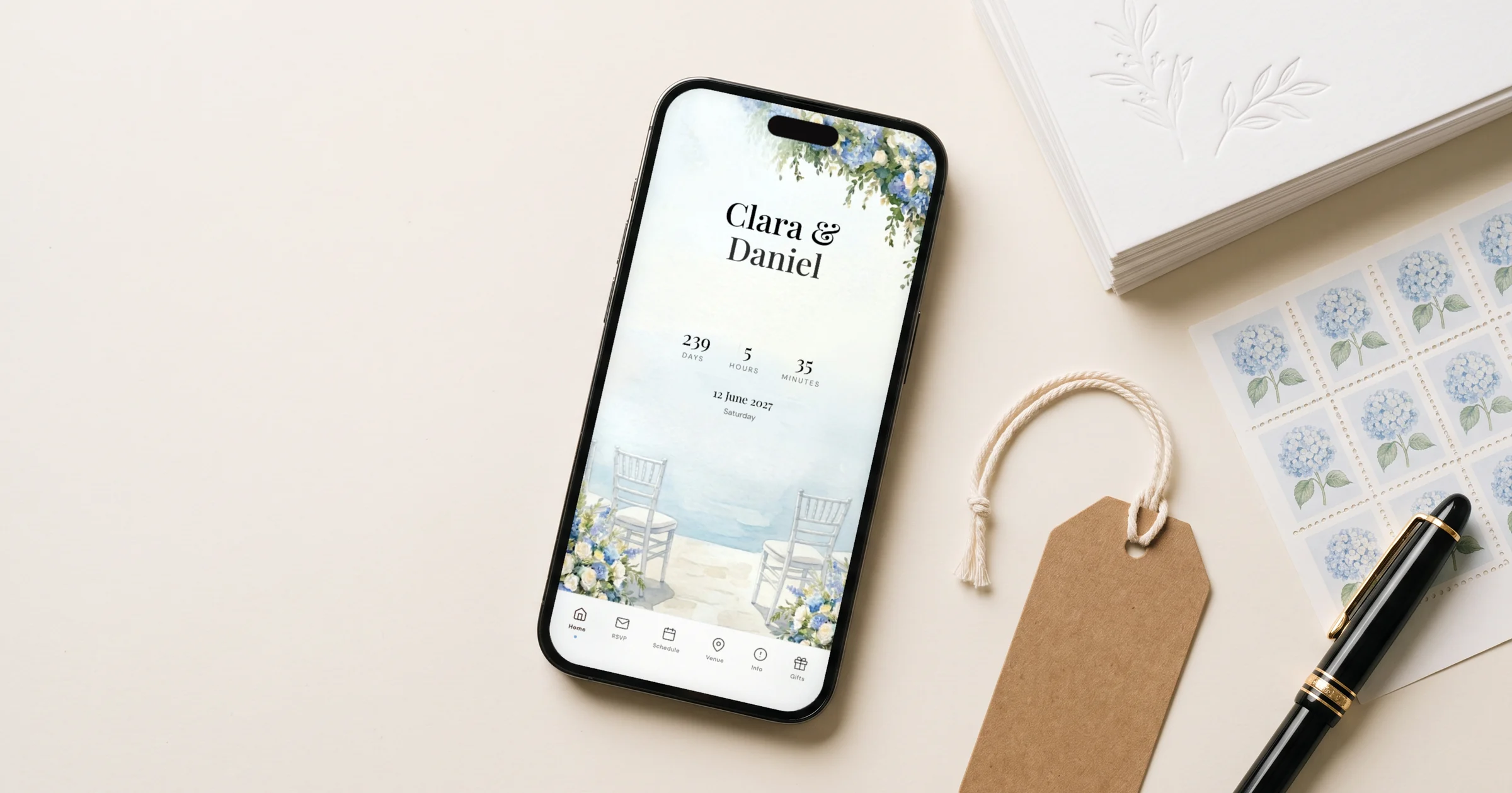 Free vs paid save the date: a phone shows a digital save the date with names, date and countdown, beside paper save the date cards and a sheet of postage stamps