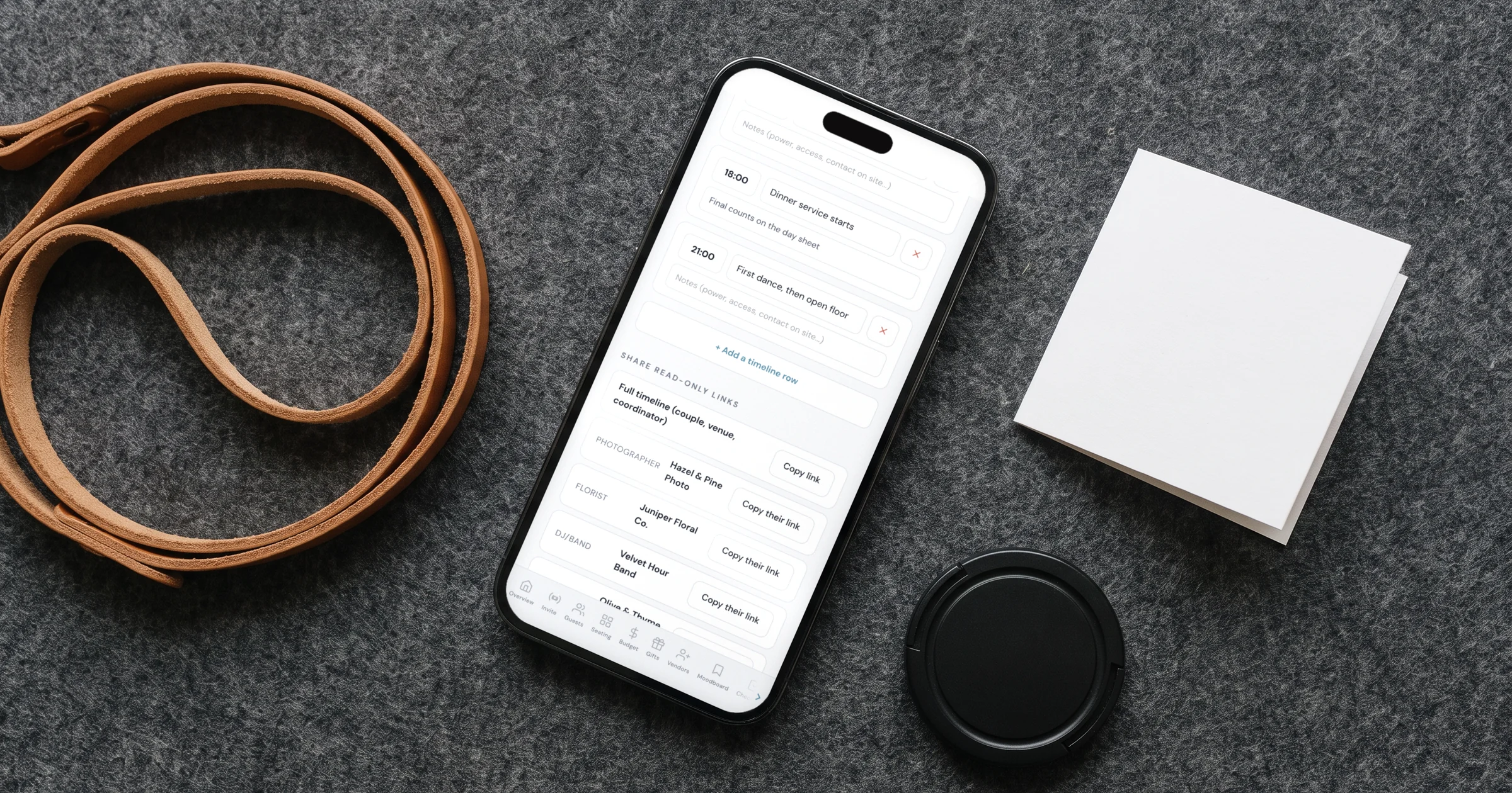 Timeline Genius alternative: a phone shows a run of show with a read-only link for the photographer next to a camera strap and lens cap