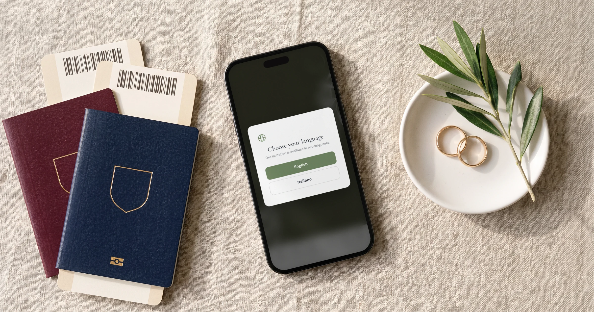Wedding website for international couples: a phone shows a wedding invitation with an English and Italian language switcher, next to two passports and two wedding bands
