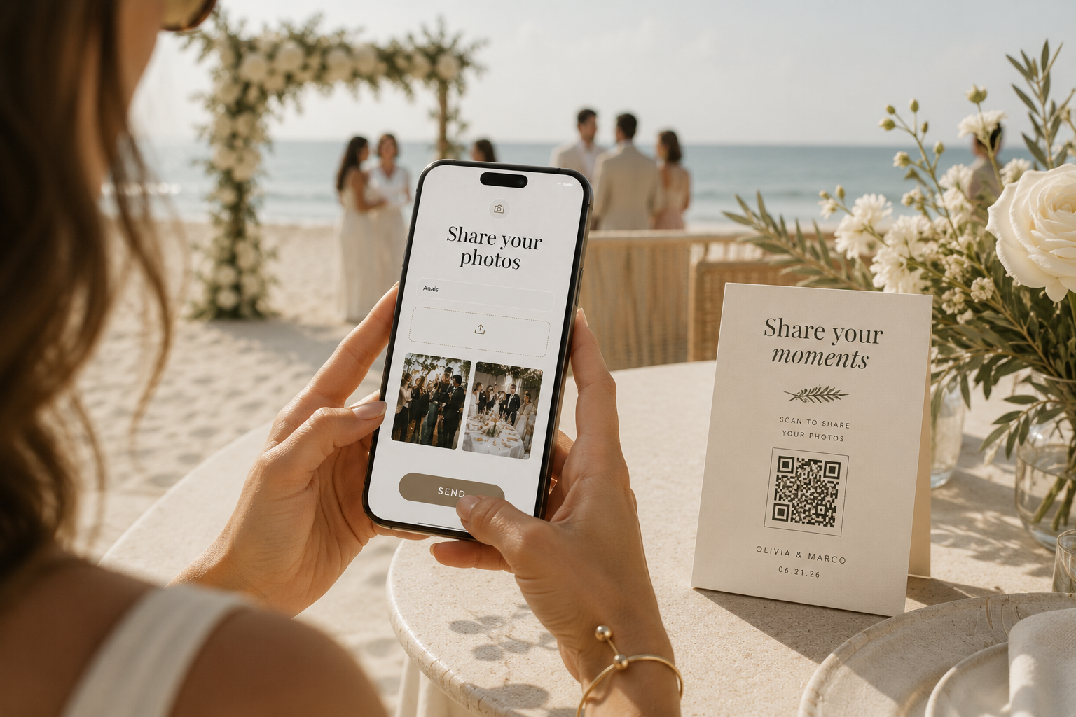 Wedding guest uploading photos on iPhone at beach ceremony with QR code table card — destination wedding photo sharing